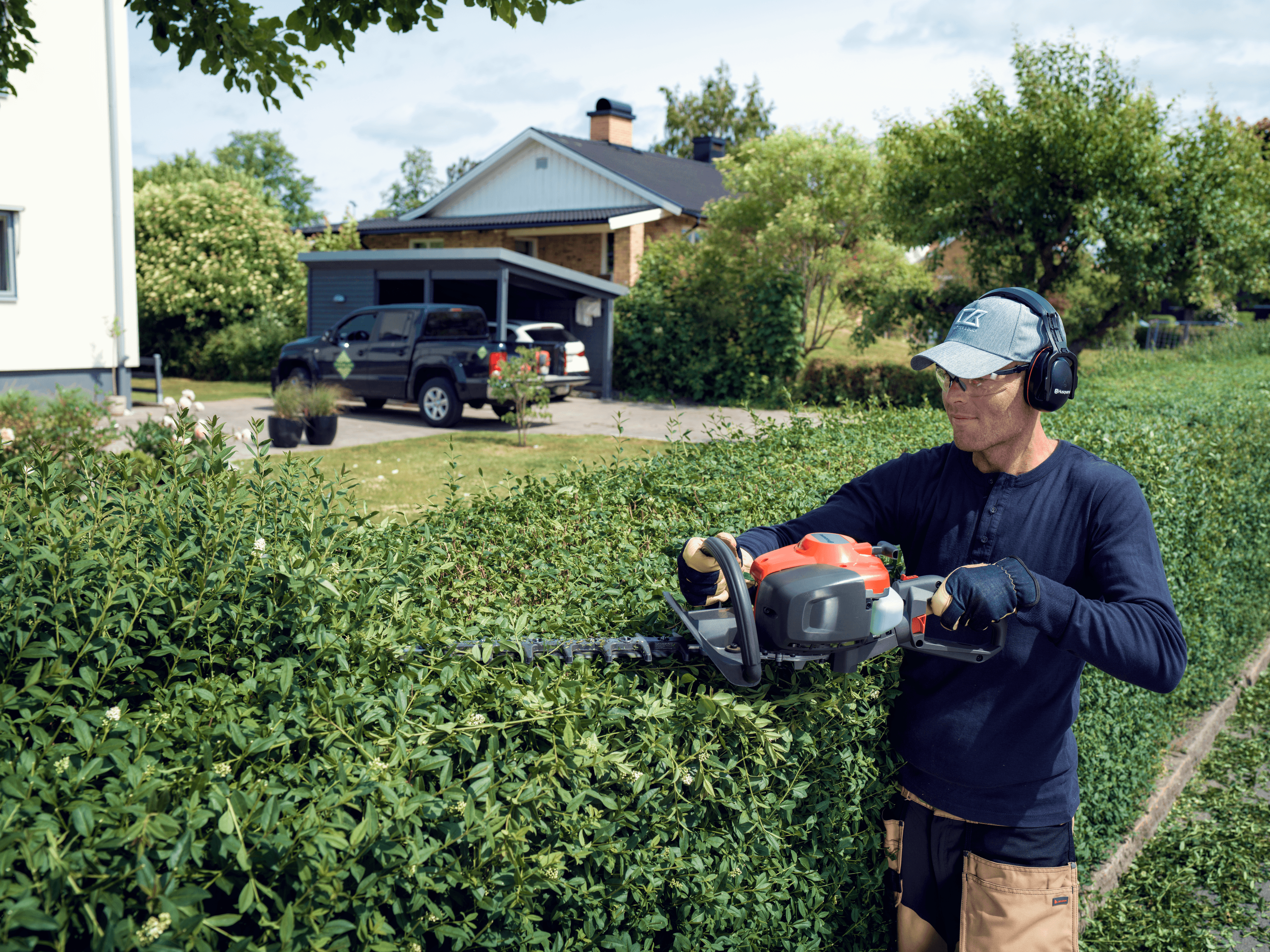 Man shaping with Shrub Shear